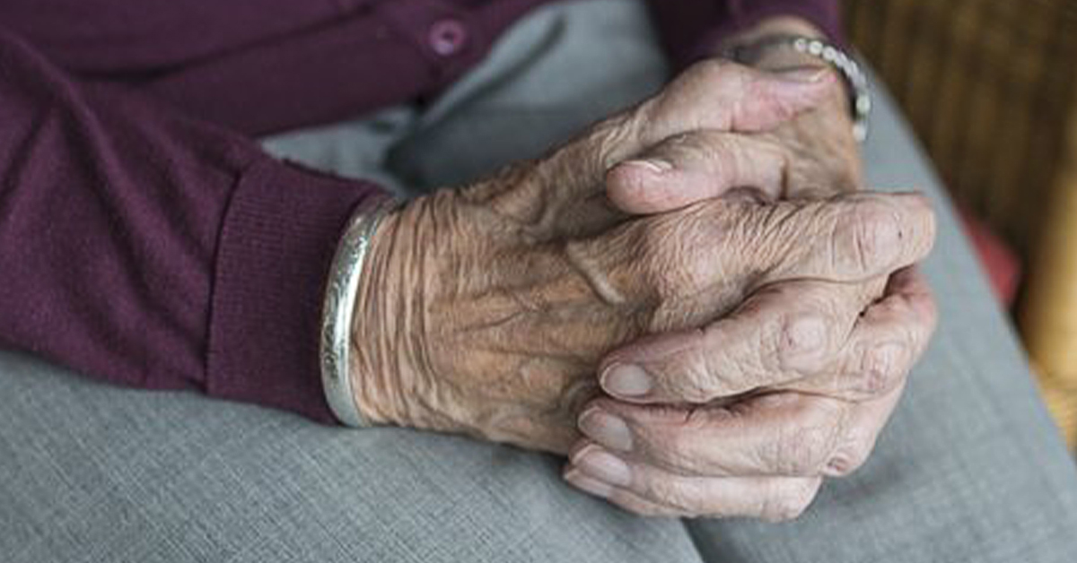 Close up of elderly hands, clasped together